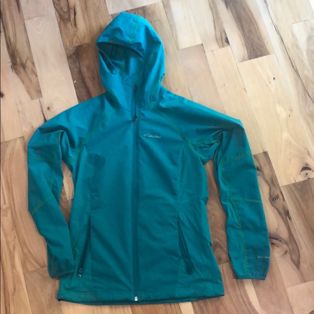 Dark teal Columbia jacket with green stitching